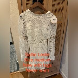 Selfie Leslie white ruffle mini dress